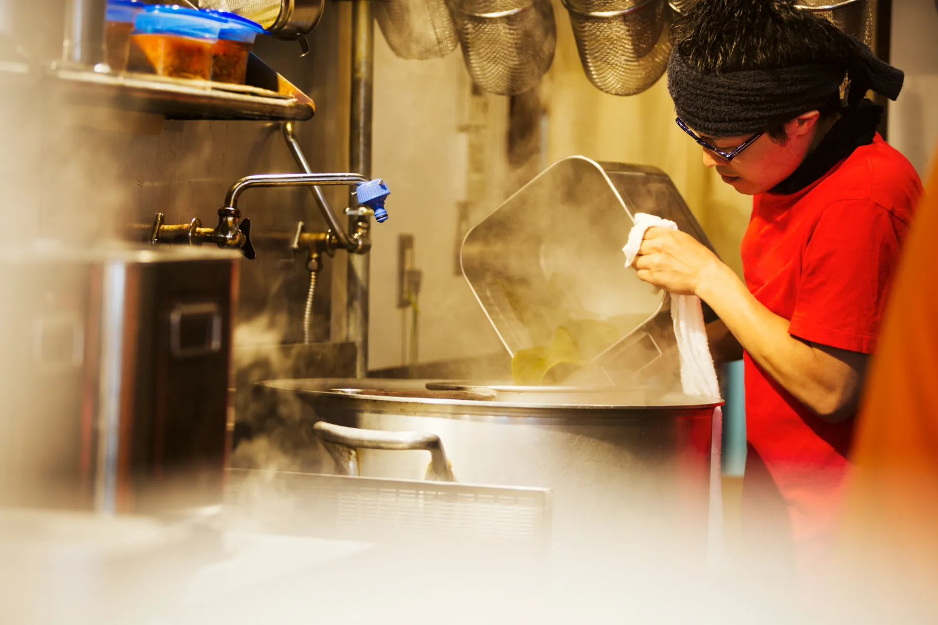 Chef working in a steamy kitchen